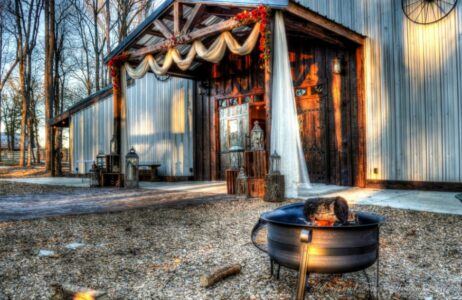 A cozy fire pit inviting guests to gather and enjoy the warmth during fall weddings.